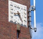 Klok met vlaggenmast.
<br/>
Marcel Westhoff, juli 2016